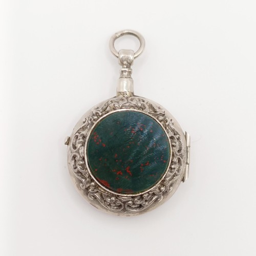 610 - A ladies silver open face pocket watch, the back inset with a bloodstone, 3 cm diameter