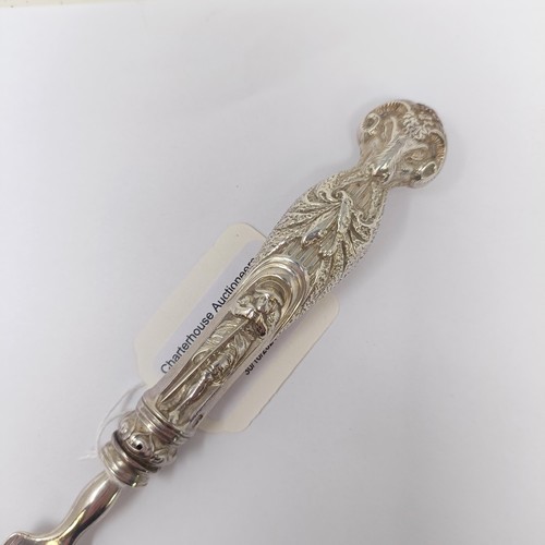 60 - A rare Victorian silver butter knife, the handle decorated rams head and figures, London 1855, 1.6 o...