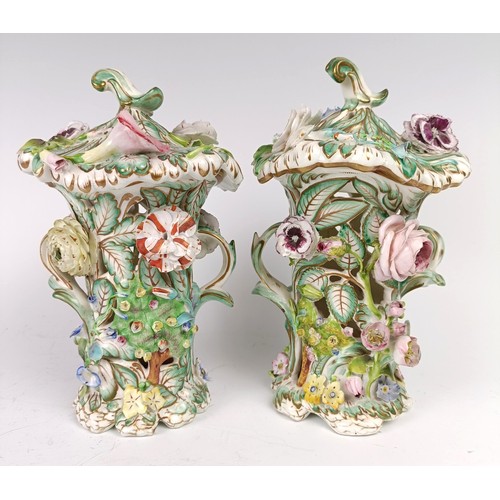 1177 - A pair of Victorian pot pourri pierced vases and covers, with floral encrusted decoration, 19 cm hig... 