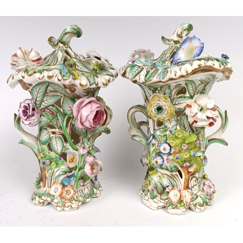 1177 - A pair of Victorian pot pourri pierced vases and covers, with floral encrusted decoration, 19 cm hig... 