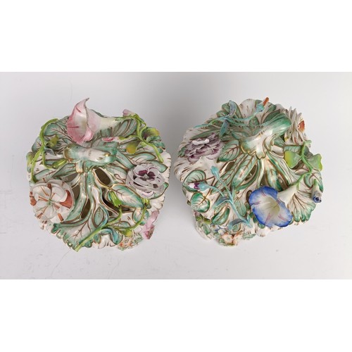 1177 - A pair of Victorian pot pourri pierced vases and covers, with floral encrusted decoration, 19 cm hig... 