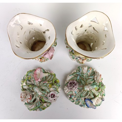 1177 - A pair of Victorian pot pourri pierced vases and covers, with floral encrusted decoration, 19 cm hig... 