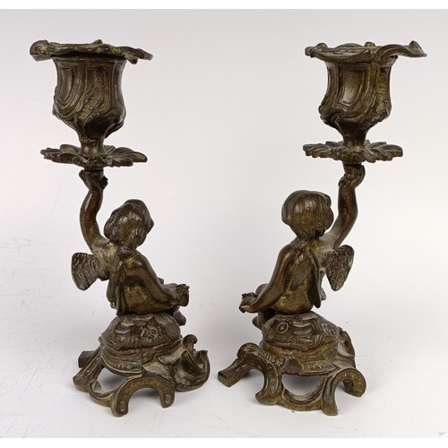 1178 - A pair of late 19th century bronze cherub candlesticks, 16. 5 cm high (2)