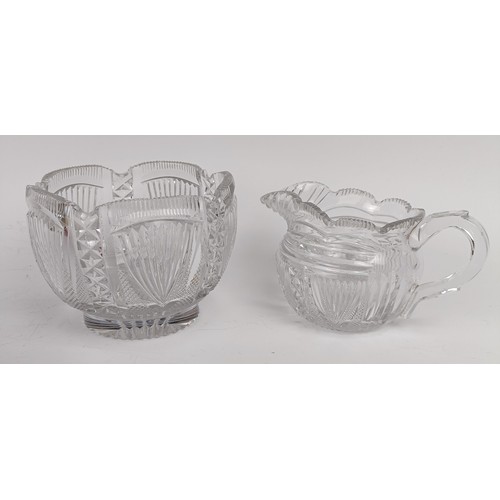 1180 - A cut glass cream jug, 10 cm high, a sugar bowl, and five glasses