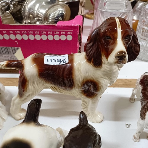 1158 - A Royal Doulton spaniel, and assorted other figures of spaniels (qty)