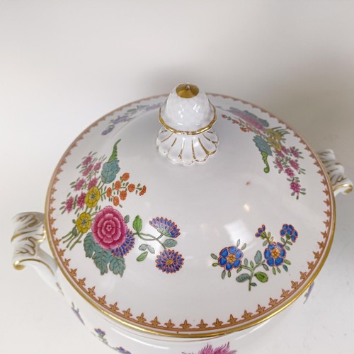 1164 - A pair of Dresden tureens and covers, decorated flowers and highlighted in gilt, 30 cm diameter