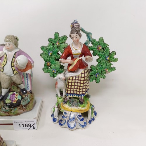 1169 - A pair of early 19th century Staffordshire hollow base bocage figures, of musicians, 18 cm high, a S... 