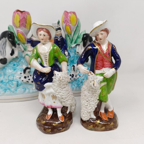 1170 - A pair of Victorian Staffordshire flatback groups, of children with dogs and ponies, 19.5 cm high, a... 