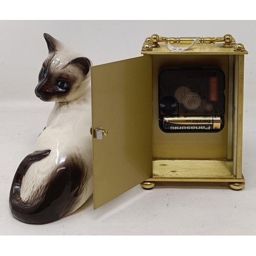 1199 - A Beswick cat, and a pair of vintage leather gloves, two carriage clocks, assorted silver plate, gla... 