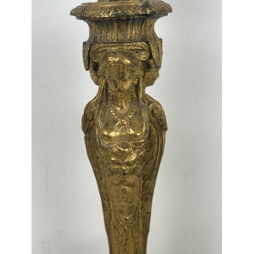 1237 - A pair of late 19th century ormolu candlesticks, with caryatid and acanthus leaf decoration, 31.5 cm... 