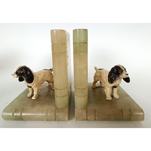 1157 - A novelty table lighter, in the form of a spaniel holding a pheasant, a pair of spaniel bookends, a ...