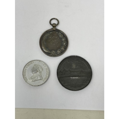 28 - A Victorian silver coloured school medal, assorted coins, assorted silver plate and a fishing reel (...