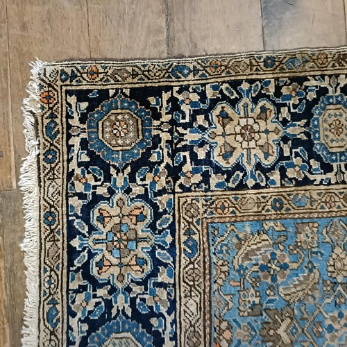 1291 - A Persian rug, 205 x 133 cm