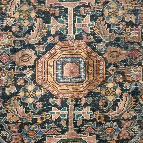 1291 - A Persian rug, 205 x 133 cm