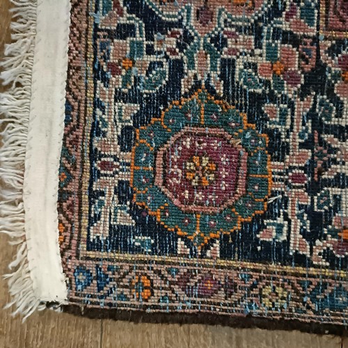 1291 - A Persian rug, 205 x 133 cm