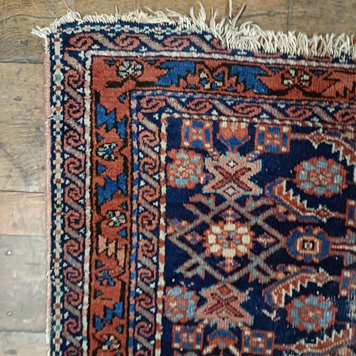 1294 - A Persian rug, 146 x 105 cm