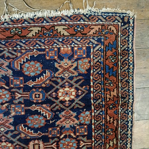 1294 - A Persian rug, 146 x 105 cm