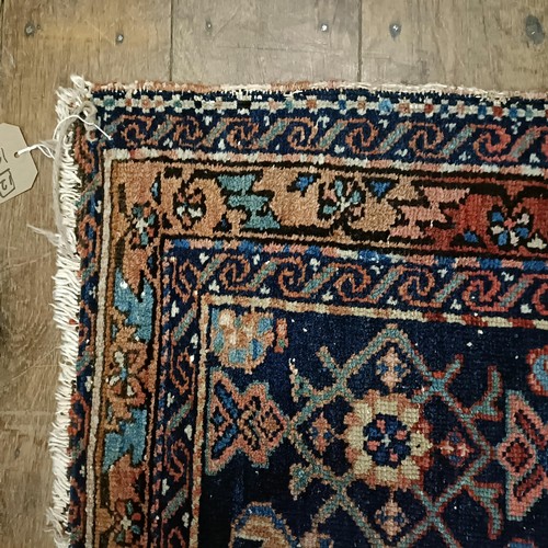 1294 - A Persian rug, 146 x 105 cm