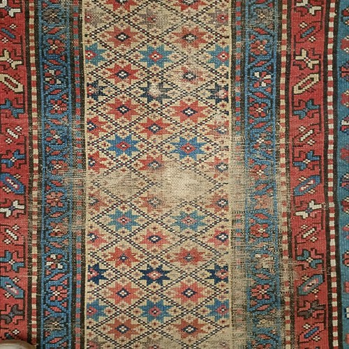 1295 - A Caucasian rug, 208 x 92 cm