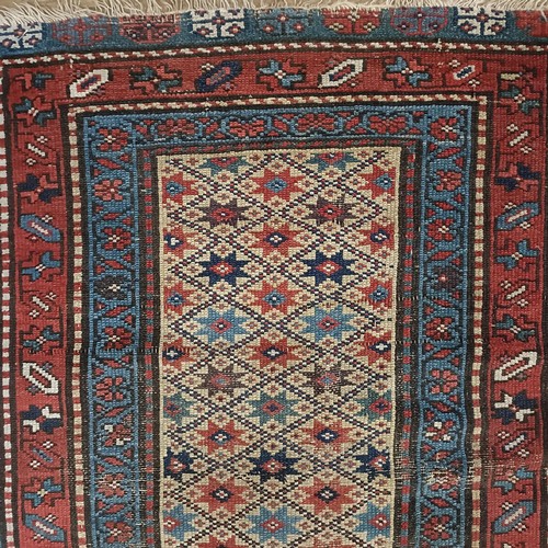 1295 - A Caucasian rug, 208 x 92 cm