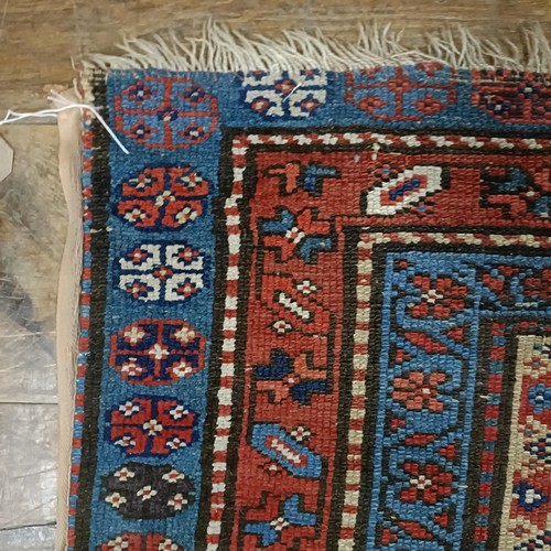 1295 - A Caucasian rug, 208 x 92 cm