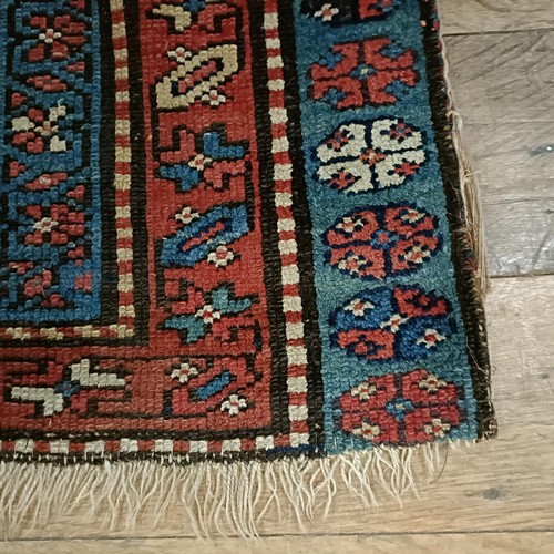 1295 - A Caucasian rug, 208 x 92 cm