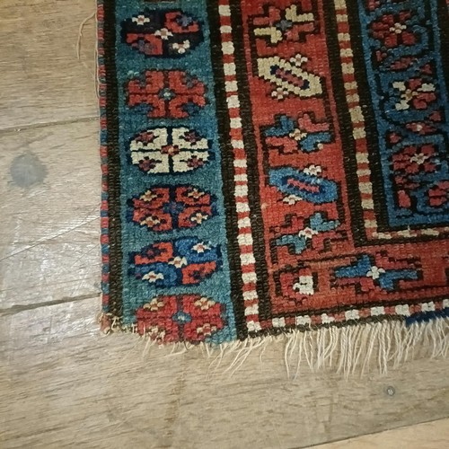 1295 - A Caucasian rug, 208 x 92 cm