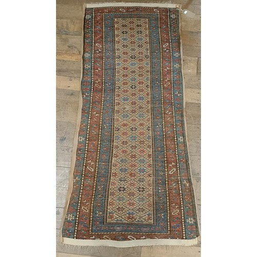 1295 - A Caucasian rug, 208 x 92 cm