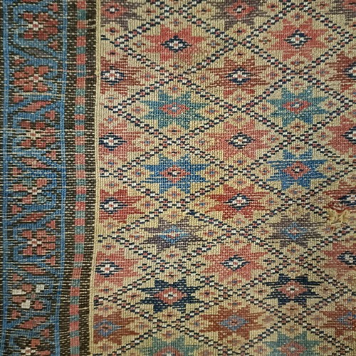 1295 - A Caucasian rug, 208 x 92 cm