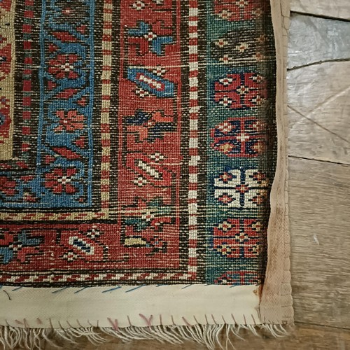 1295 - A Caucasian rug, 208 x 92 cm