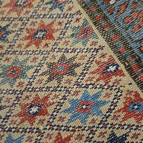 1295 - A Caucasian rug, 208 x 92 cm