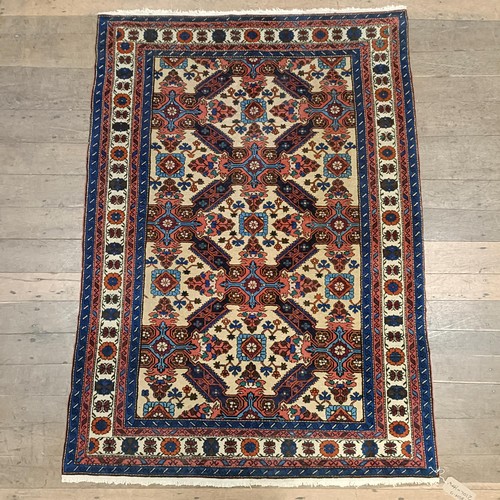 1300 - A Caucasian rug, 210 x 144 cm