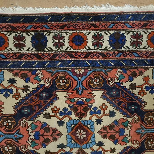 1300 - A Caucasian rug, 210 x 144 cm