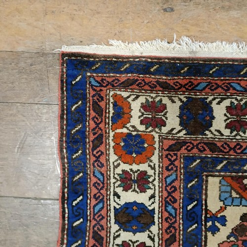 1300 - A Caucasian rug, 210 x 144 cm