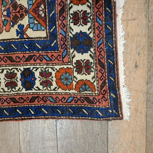 1300 - A Caucasian rug, 210 x 144 cm