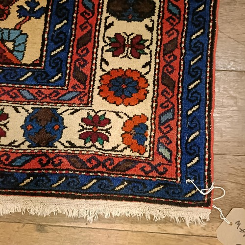 1300 - A Caucasian rug, 210 x 144 cm