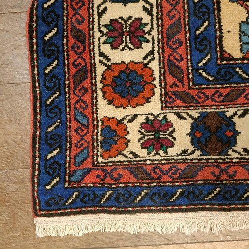 1300 - A Caucasian rug, 210 x 144 cm