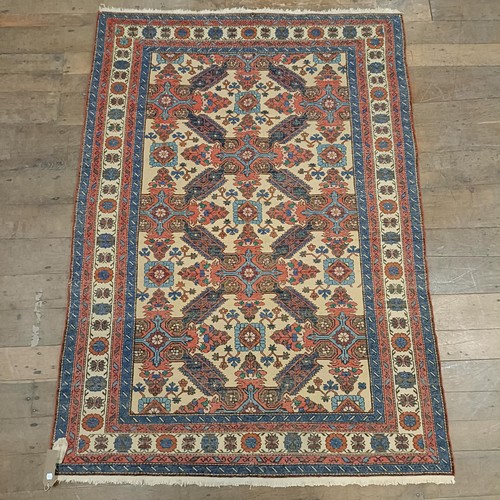 1300 - A Caucasian rug, 210 x 144 cm