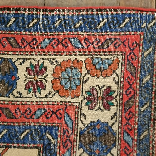 1300 - A Caucasian rug, 210 x 144 cm