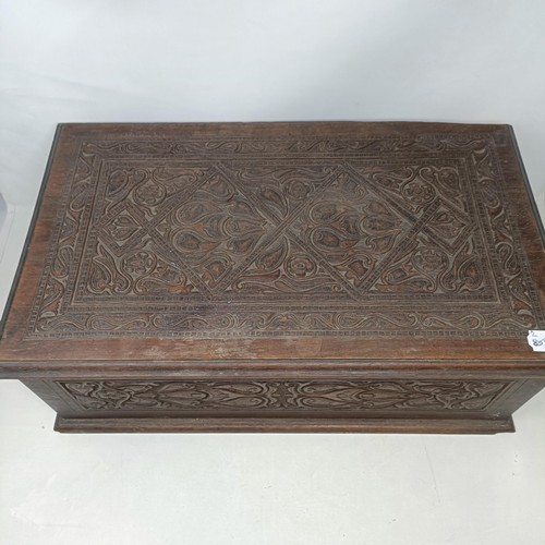 1267 - An Indian carved wooden box, 50 cm wide