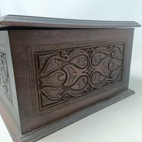 1267 - An Indian carved wooden box, 50 cm wide