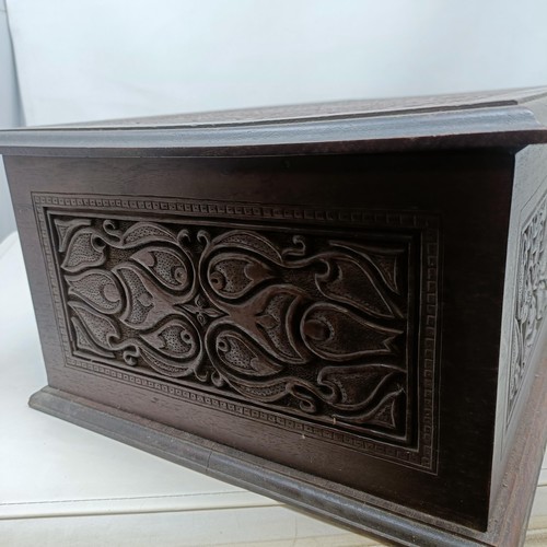 1267 - An Indian carved wooden box, 50 cm wide