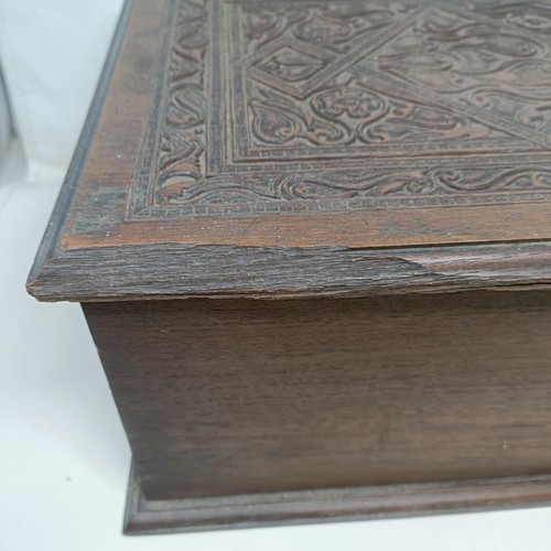 1267 - An Indian carved wooden box, 50 cm wide