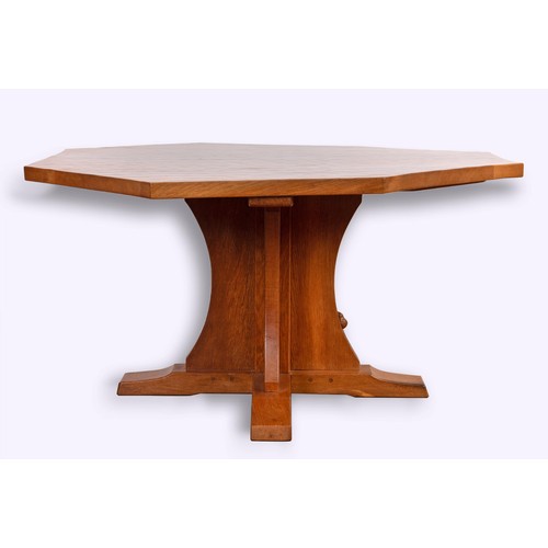 1333 - A Robert 'Mouseman' Thompson of Kilburn adzed oak octagonal dining table, 140 cm wide