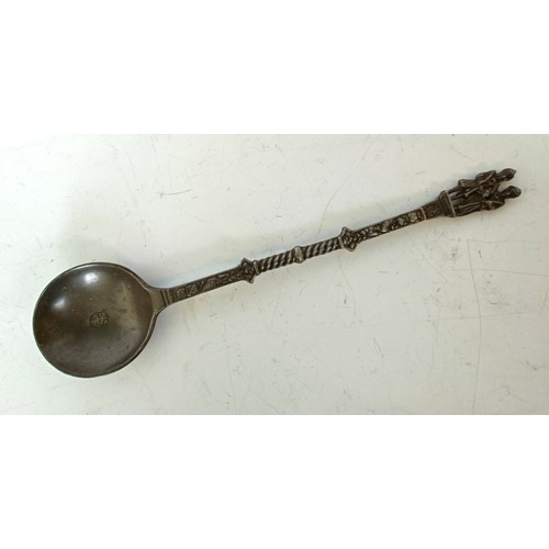 1250 - A pewter spoon, with figural finial