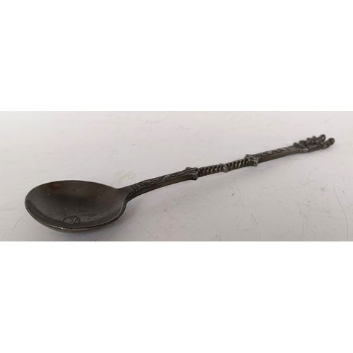 1250 - A pewter spoon, with figural finial