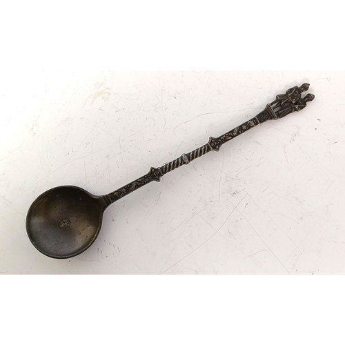 1250 - A pewter spoon, with figural finial