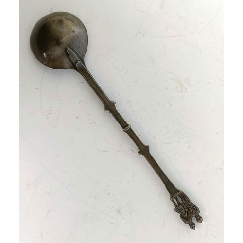 1250 - A pewter spoon, with figural finial