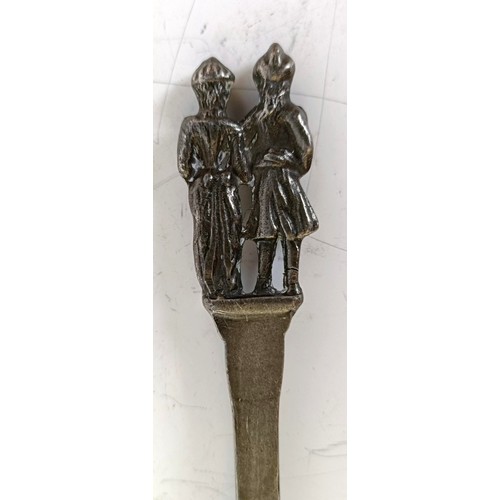 1250 - A pewter spoon, with figural finial