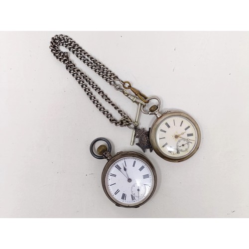 655 - A silver open face pocket watch, with a chain, and another silver open face pocket watch (2)